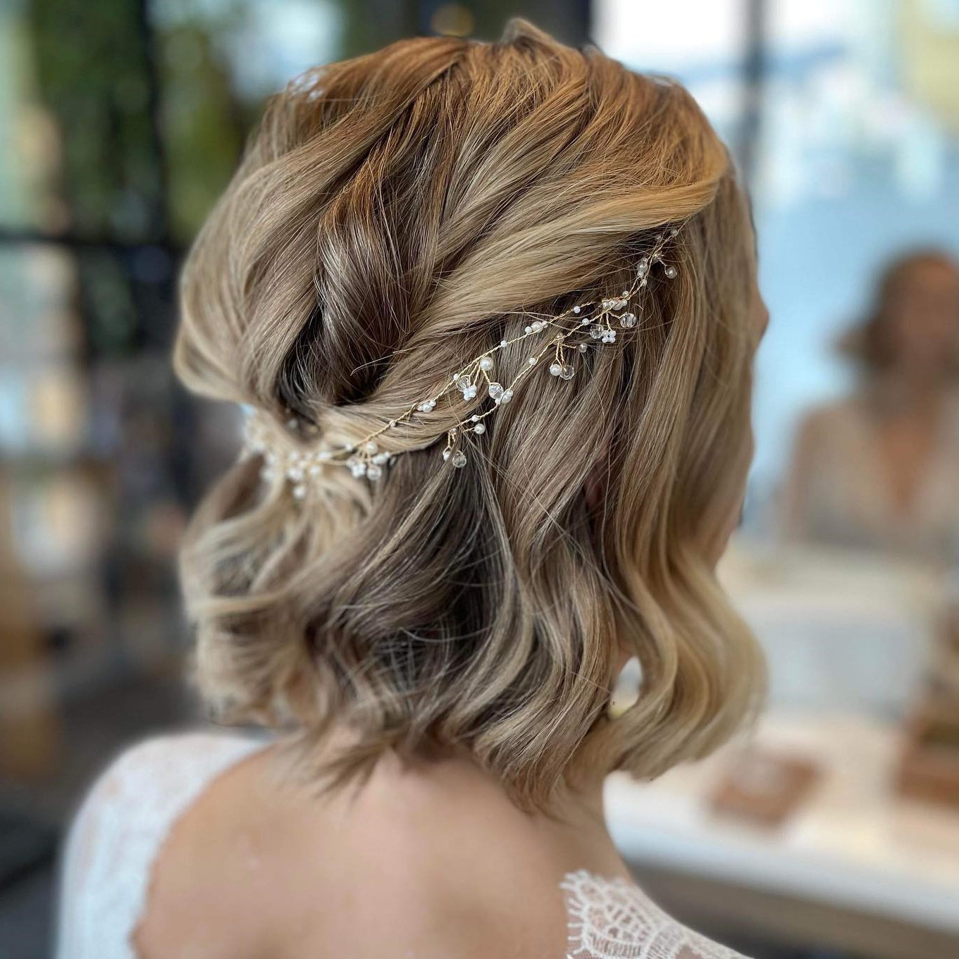 Delicate Bridal Half-Up Bob Hairstyle