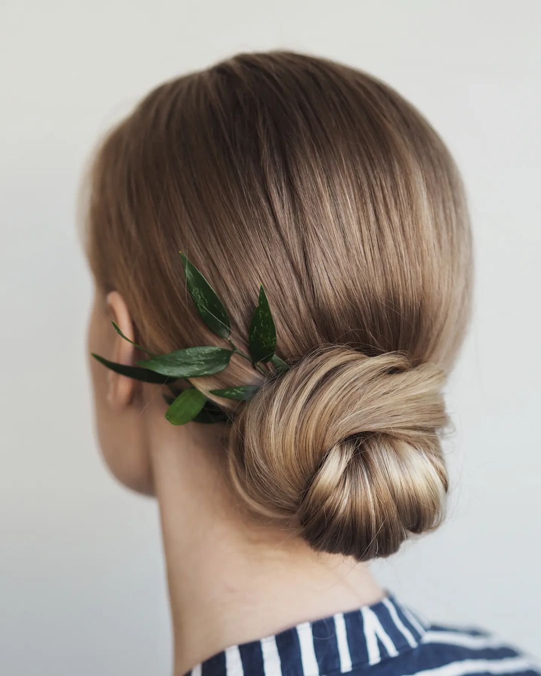 Minimalist Sleek Low Knot Updo