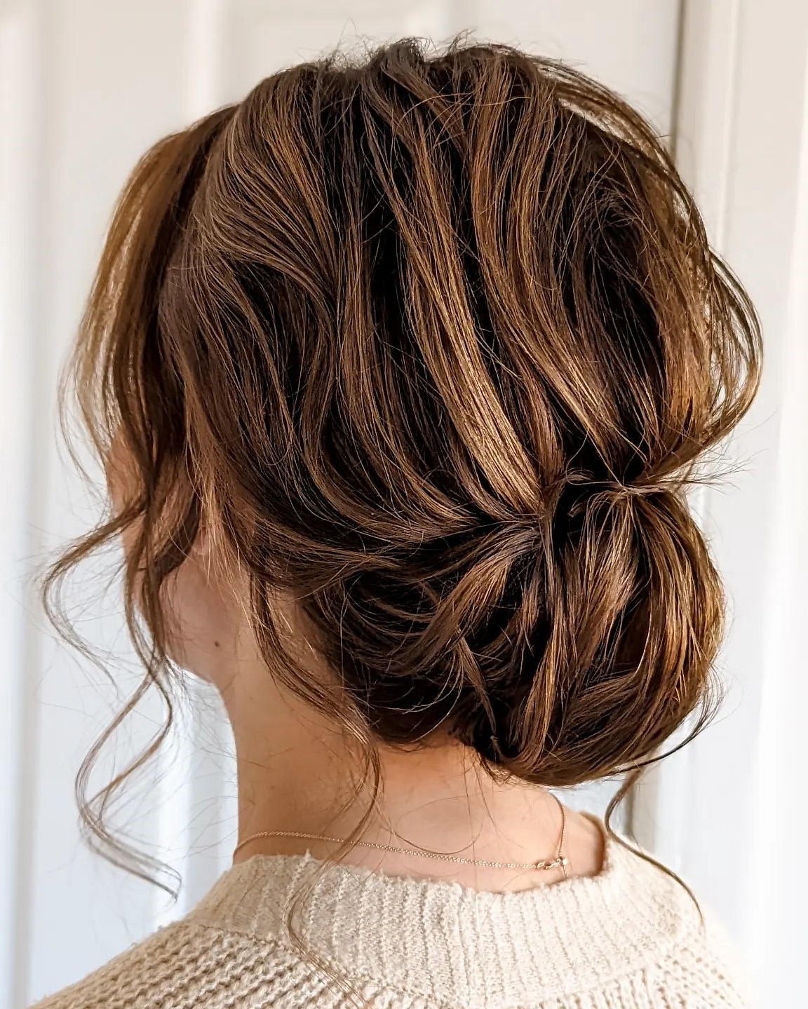 Messy Low Roll Updo