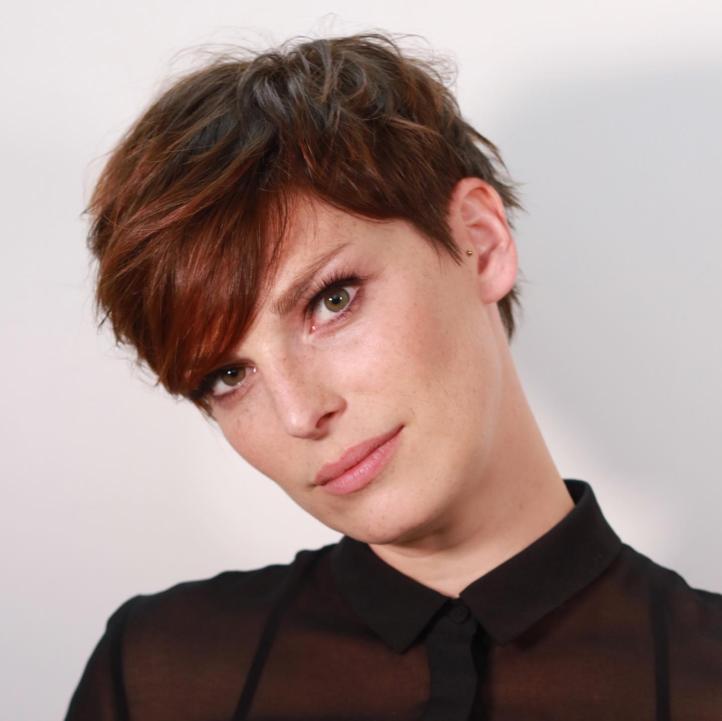 Neat Feathered Pixie with Bangs to the Side